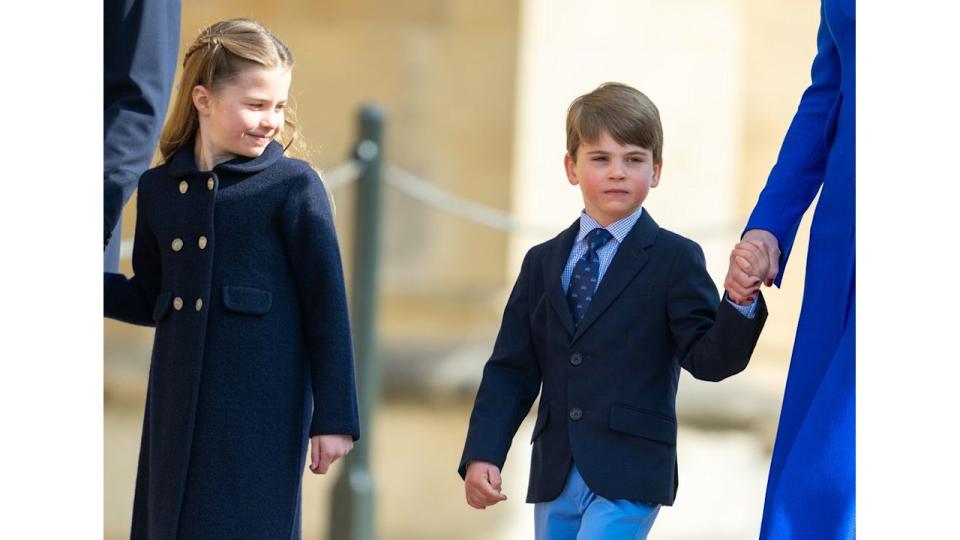 Princess Charlotte and Prince Louis walking