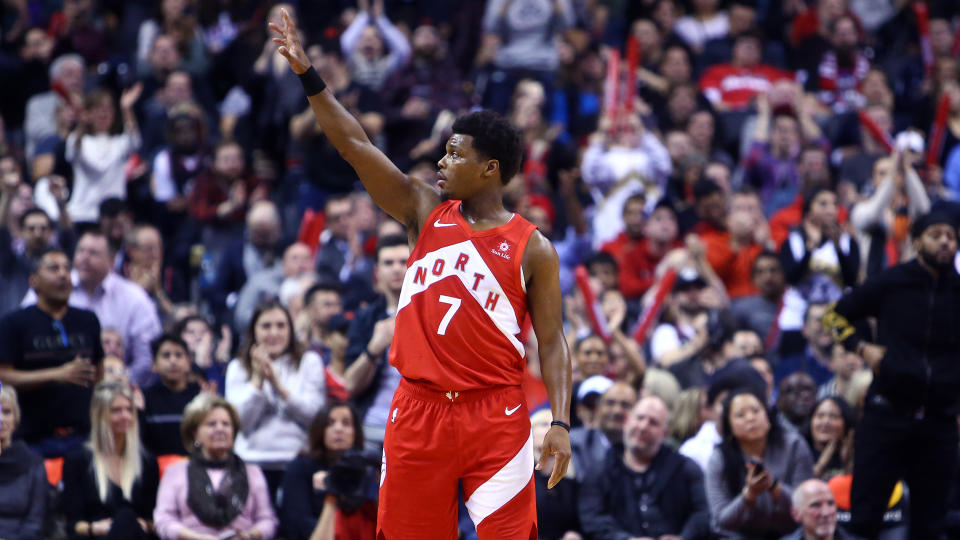 TORONTO, ON - JANUARY 17:  Kyle Lowry #7 of the Toronto Raptors waves to fans after he reached his 5,000 career assist early in the second half of an NBA game against the Phoenix Suns at Scotiabank Arena on January 17, 2019 in Toronto, Canada.  NOTE TO USER: User expressly acknowledges and agrees that, by downloading and or using this photograph, User is consenting to the terms and conditions of the Getty Images License Agreement.  (Photo by Vaughn Ridley/Getty Images)