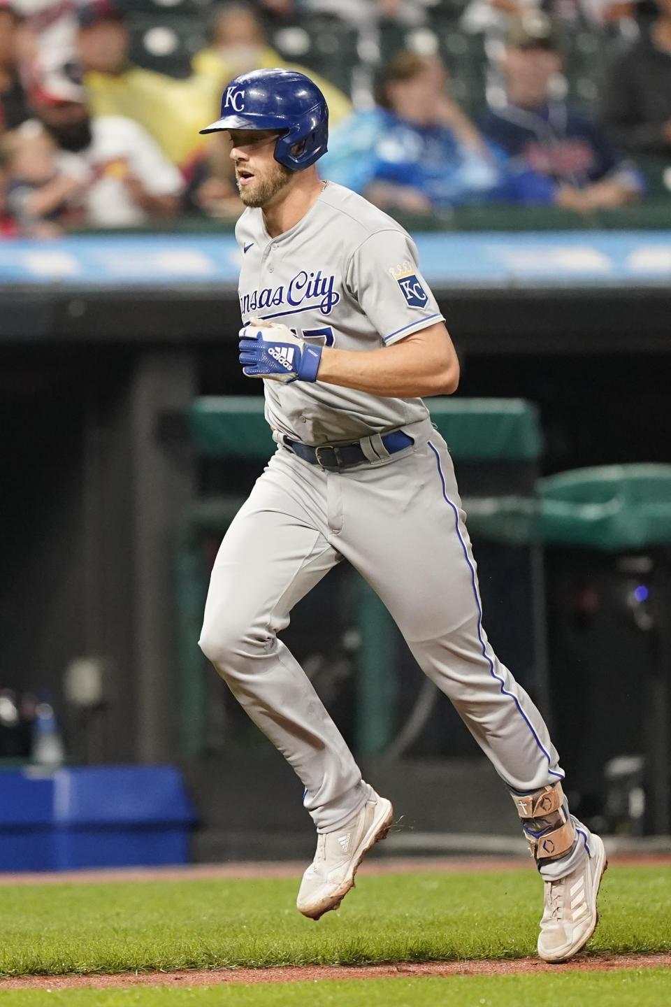Kansas City Royals' Hunter Dozier runs the bases after hitting a solo home run in the seventh inning of a baseball game against the Cleveland Indians, Tuesday, Sept. 21, 2021, in Cleveland. (AP Photo/Tony Dejak)