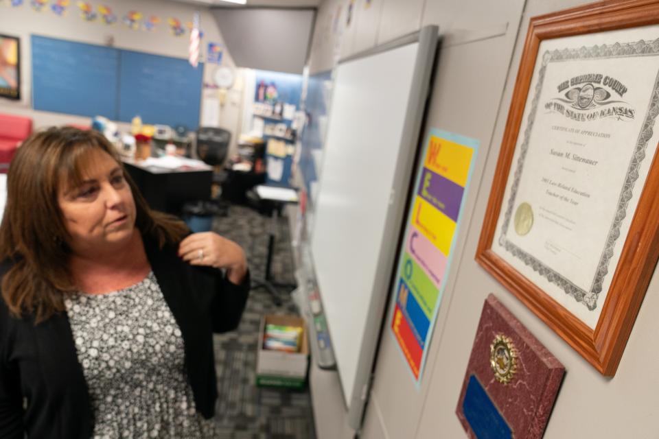Seaman High social studies teacher Susan Sittenauer has won several national and state awards for teaching, such as the Supreme Court of Kansas Law-Related Education Teacher of the Year she received in 2003.