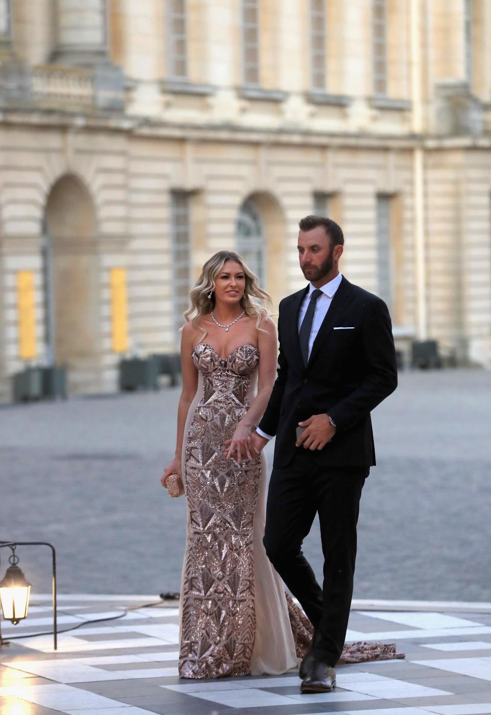 Dustin Johnson and Paulina Gretzky arrive at the Ryder Cup Gala dinner at the Palace of Versailles ahead of the 2018 Ryder Cup on September 26, 2018 in Versailles, France.