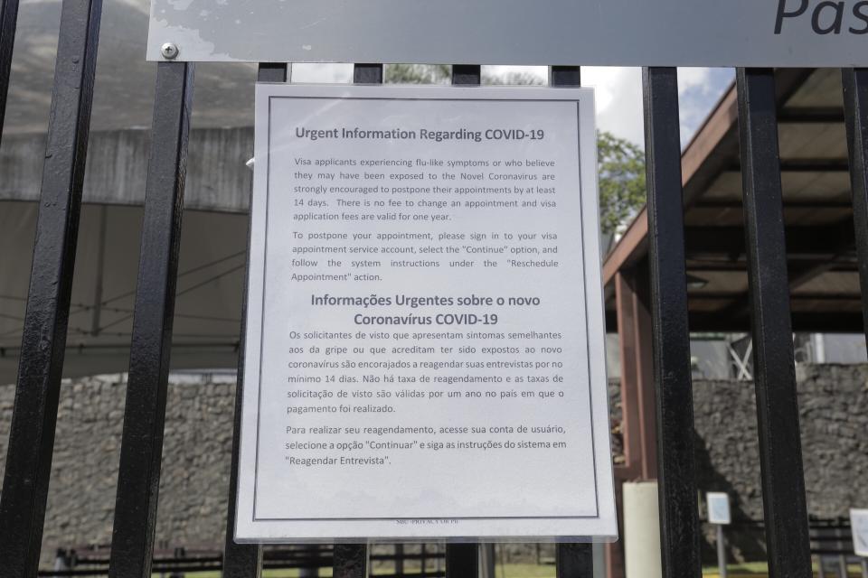  A sign at the gates of U.S consulate in Sao Paulo, Brazil on March 25, 2020 reads that the building is closed due to the coronavirus pandemic. All visa appointments were postponed and the United States Embassy in Brazil recommended their citizens to return to the U.S. (Rebeca Figueiredo Amorim/Getty Images)