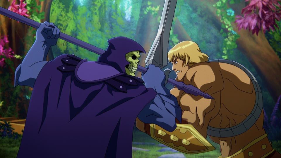 Skeletor and He-Man stand face to face with weapons in a forest