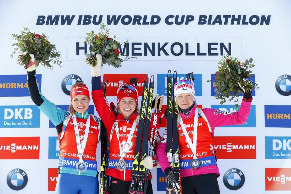 From left, second placed Czech Republic's Gabriela Koukalova, winner Norway's Tiril Eckhoff and third placed Finland's Kaisa Makarainen, celebrate on the podium after the women's IBU Biathlon World Cup, in Oslo, Sunday, March 19, 2017. (Heiko Junge, NTB scanpix via AP)