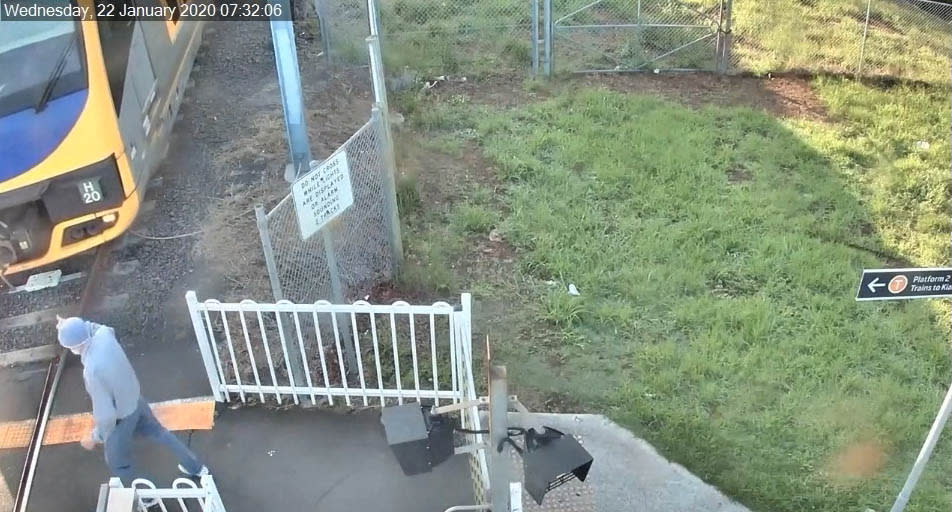 A screenshot of CCTV showing the moment an oncoming train was forced to suddenly stop to avoid hitting a pedestrian on the tracks at Albion Park. Source: Transport for NSW