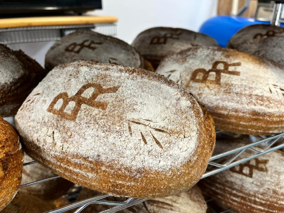 Bayview Bread's Mike Riggs likes to decorate the tops of his breads with letters to denote its kind, like "BR" for his Bavarian Rye.