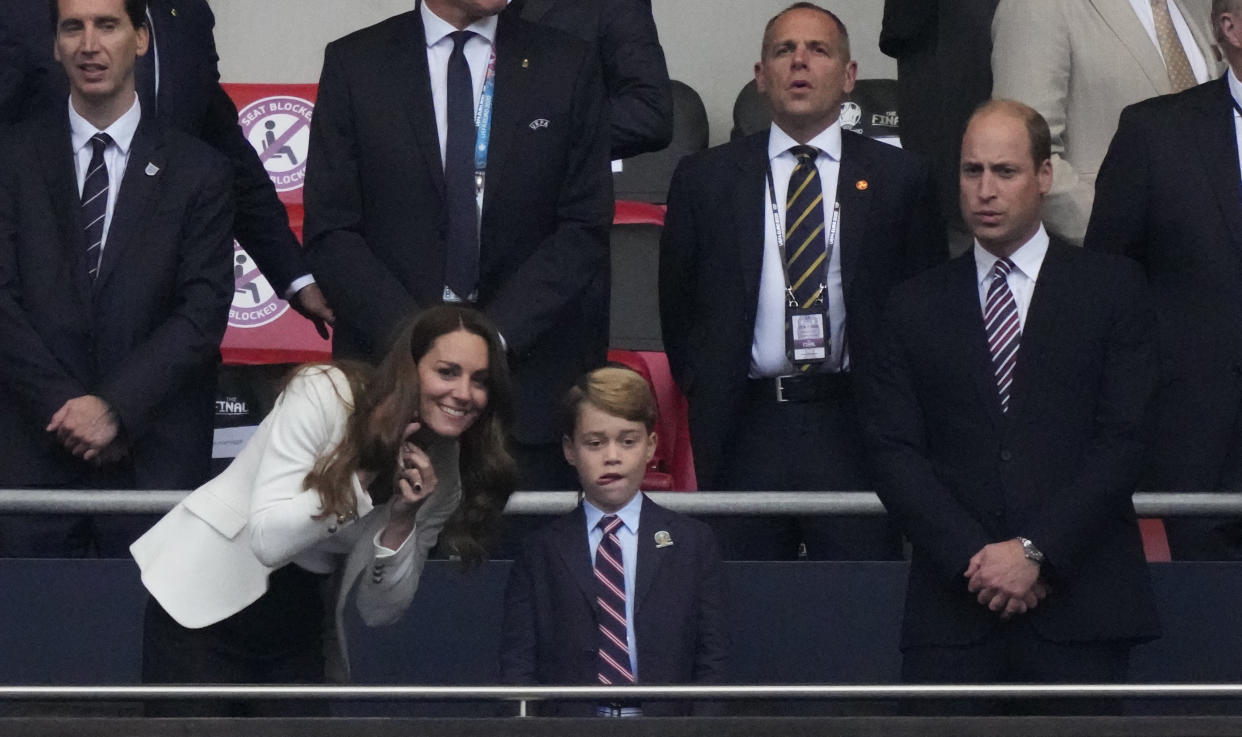 Britain's Catherine (L), Duchess of Cambridge, Prince George of Cambridge (C), and Britain's Prince William (R), Duke of Cambridge, are seen during the UEFA EURO 2020 final football match between Italy and England at the Wembley Stadium in London on July 11, 2021. (Photo by Frank Augstein / POOL / AFP) (Photo by FRANK AUGSTEIN/POOL/AFP via Getty Images)