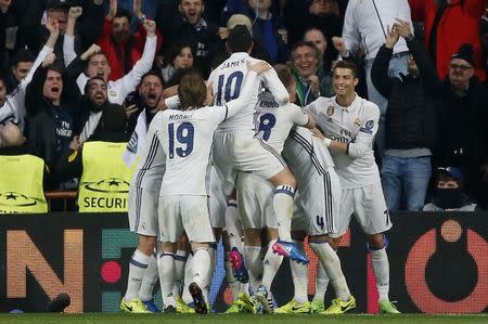 Football Soccer - Real Madrid v Napoli - UEFA Champions League Round of 16 First Leg - Estadio Santiago Bernabeu, Madrid, Spain - 15/2/17 Real Madrid's Casemiro celebrates scoring their third goal with team mates Reuters / Susana Vera Livepic