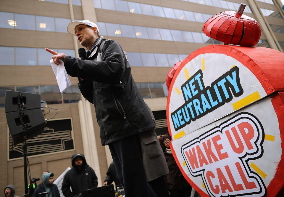 Protesters rally at FCC against repeal of net neutrality rules