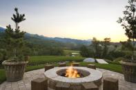 The home boasts a stunning outdoor fire pit for all those late night parties.