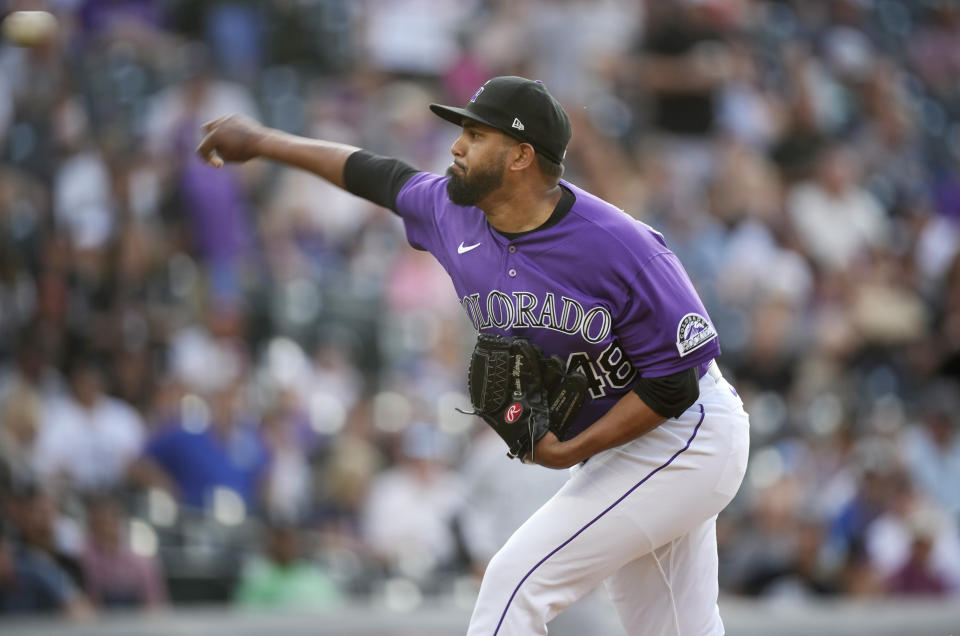 Colorado Rockies starting pitcher German Marquez works against the Chicago White Sox in the first inning of a baseball game Tuesday, July 26, 2022, in Denver. (AP Photo/David Zalubowski)