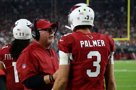 Sep 25, 2017; Glendale, AZ, USA; Arizona Cardinals head coach Bruce Arians talks with Arizona Cardinals quarterback Carson Palmer (3) during the second half against the Dallas Cowboys at University of Phoenix Stadium. Mandatory Credit: Joe Camporeale-USA TODAY Sports