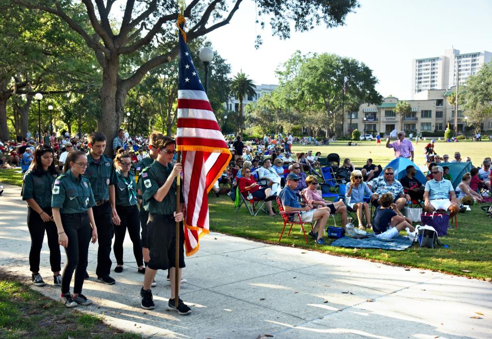 A color guard from Venture Crew 26 part of the Boy Scouts of America parades the colors near the start of a 2017 Memorial Day concert and picnic in Jacksonville.