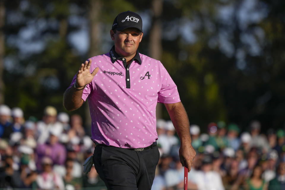 Patrick Reed waves after his putt on the 18th hole during the final round of the Masters golf tournament at Augusta National Golf Club on Sunday, April 9, 2023, in Augusta, Ga. (AP Photo/Matt Slocum)