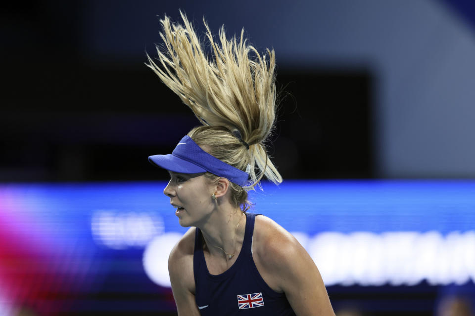 Katie Boulter of Great Britain's hair flies as she serves during her match against Ajla Tomljanovic of Australia during the United Cup tennis tournament in Perth, Australia, Friday, Dec. 29, 2023. (AP Photo/Trevor Collens)