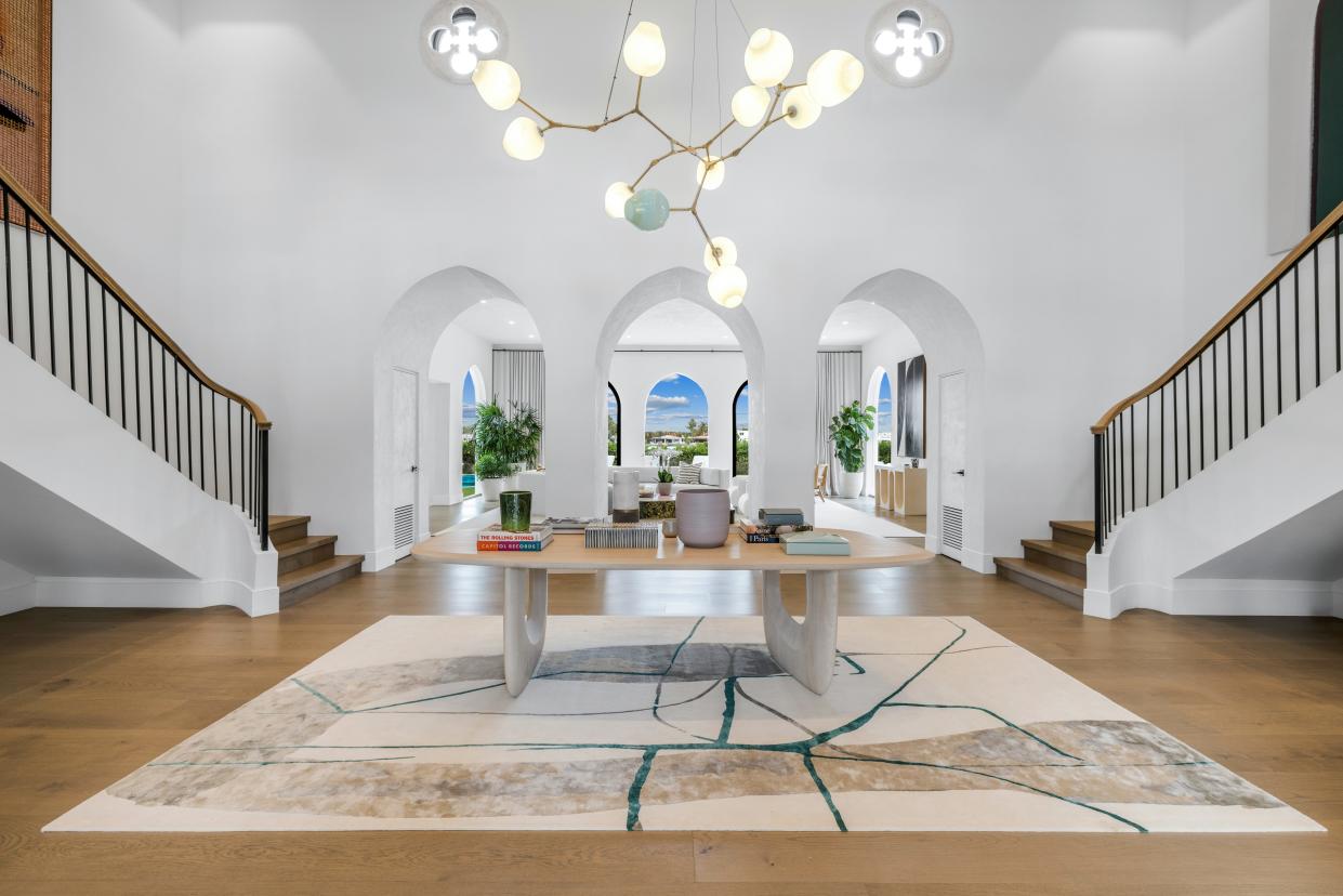 A mansion on La Gorce Island formerly belonging to pop icon Cher is on the market for $42.5 million. The home features dual grand staircases and Brazilian oak flooring.