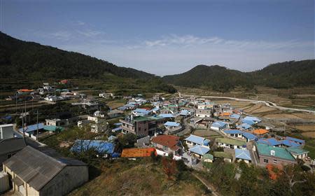 General veiw of Nongso village where 18 fisherman were abducted by North Korea in 1972, is seen in Geoje, about 470 km (292 miles) southeast of Seoul October 29, 2013. REUTERS/Kim Hong-Ji