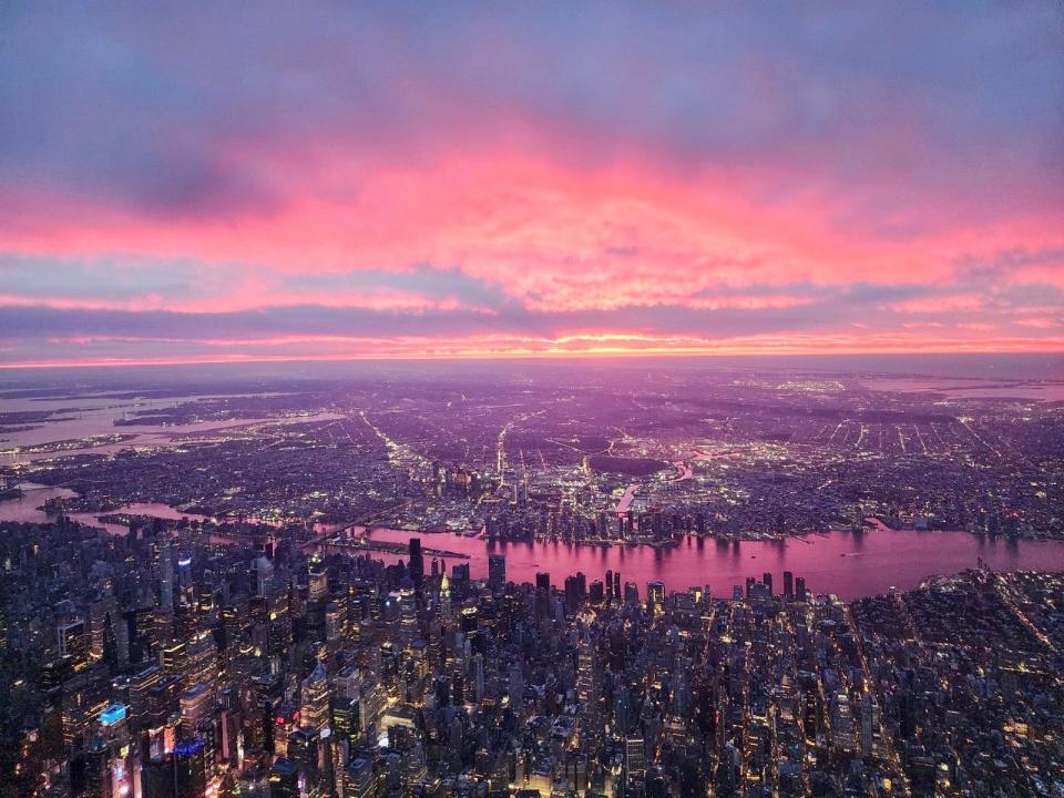 Pink skies over NYC from a plane.