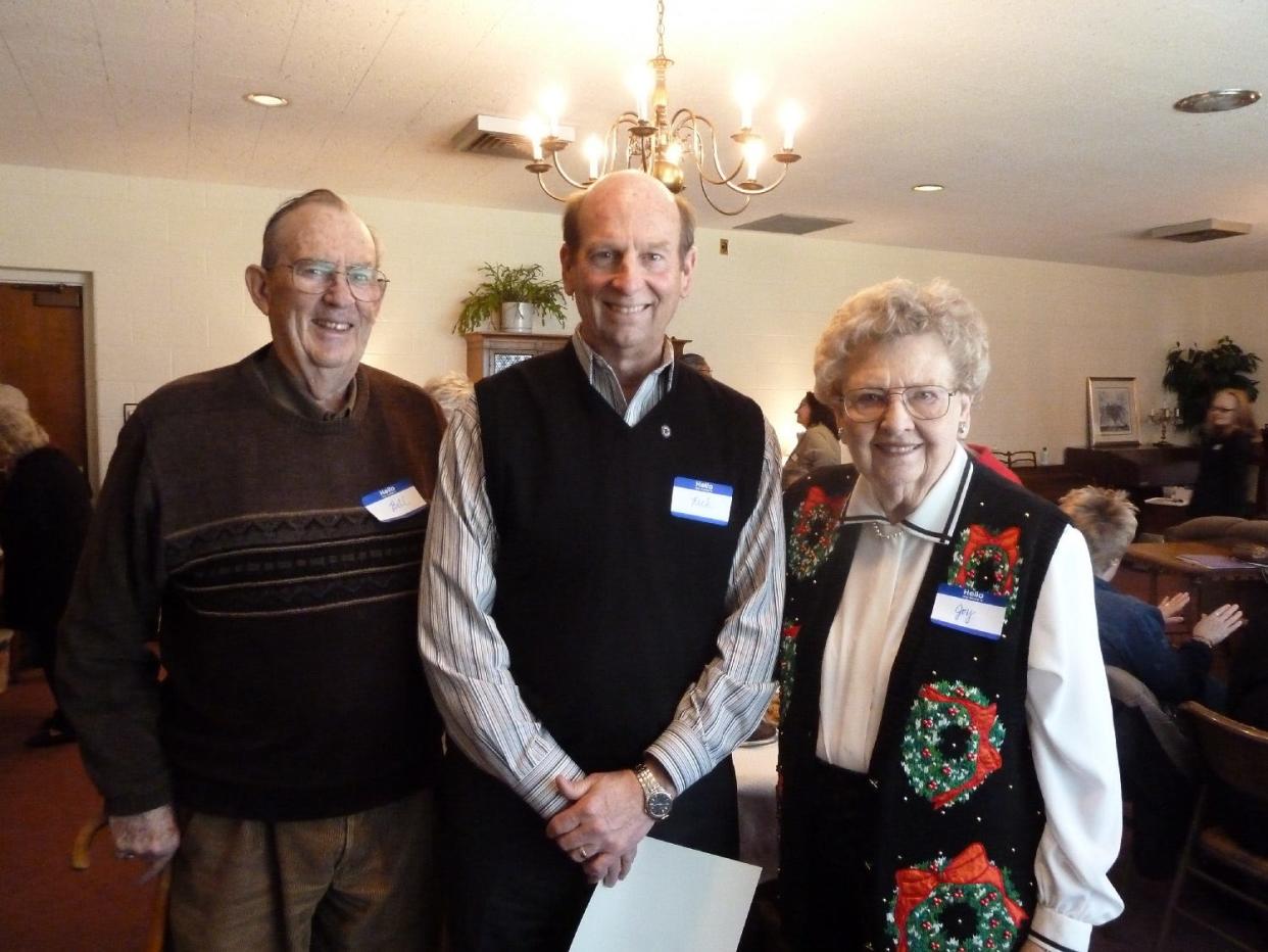 The Philip Livingston Chapter of the Daughters of the American Revolution present a 2014 Community Service Award to Rick Scofield (center).
