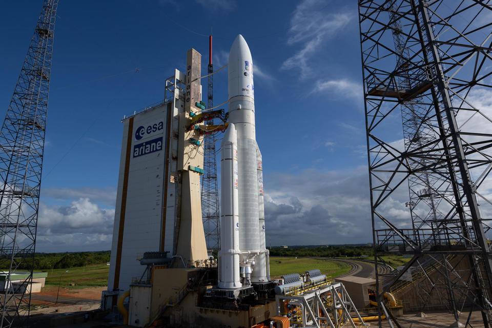 An Ariane 5 rocket carrying the European Space Agency's $1.7 billion Jupiter probe was hauled to its launch stand in French Guiana Wednesday, setting the stage for launch Thursday on an eight-year voyage to the solar system's largest planet. / Credit: Stephane Corvaja