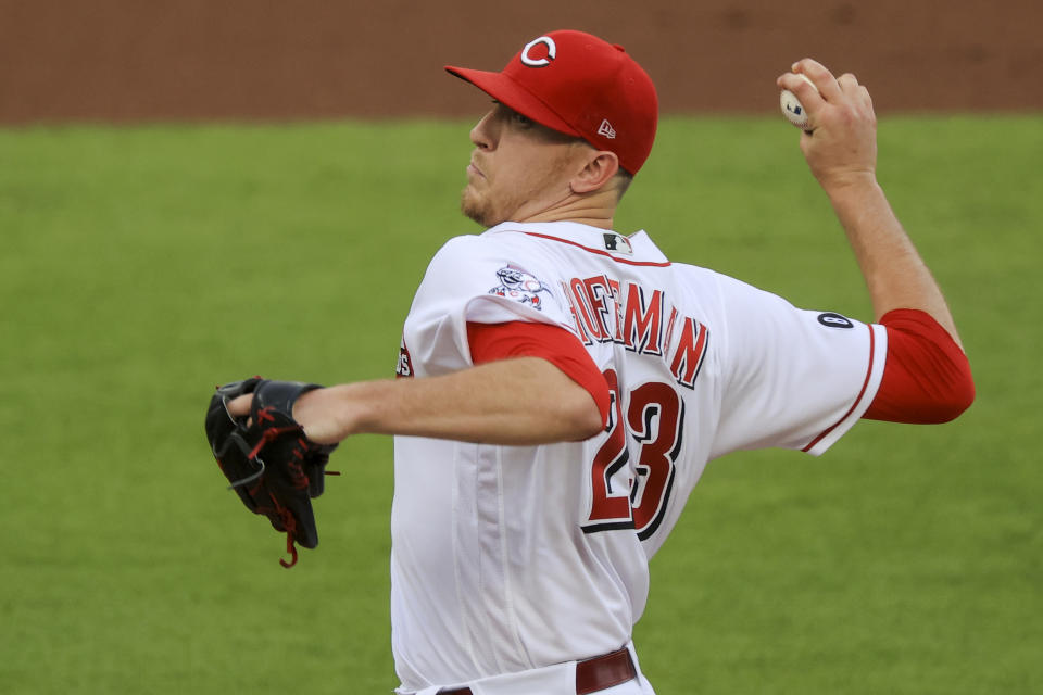 Cincinnati Reds' Jeff Hoffman throws during the second inning of a baseball game against the Milwaukee Brewers in Cincinnati, Friday, May 21, 2021. (AP Photo/Aaron Doster)