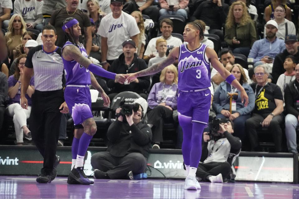 Utah Jazz’s Jordan Clarkson, left, and Keyonte George celebrate during a game against the Portland Trail Blazers on Nov. 14, 2023, in Salt Lake City. The Jazz rookie has Clarkson clicking early this season. | Rick Bowmer, Associated Press