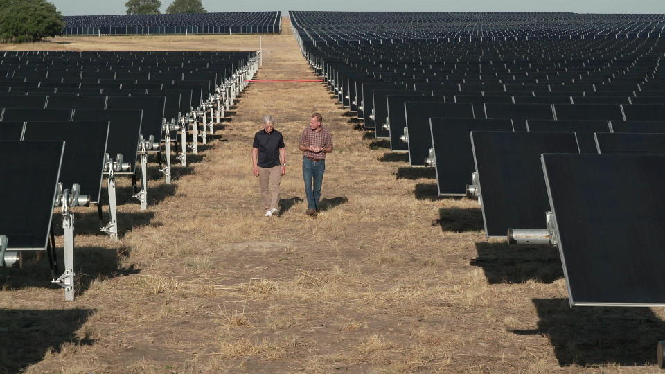 Apple CEO Tim Cook with CBS News' John Dickerson, at a solar energy installation north of Austin that can power more than 100,000 homes (and, not coincidentally, many Apple devices).  / Credit: CBS News