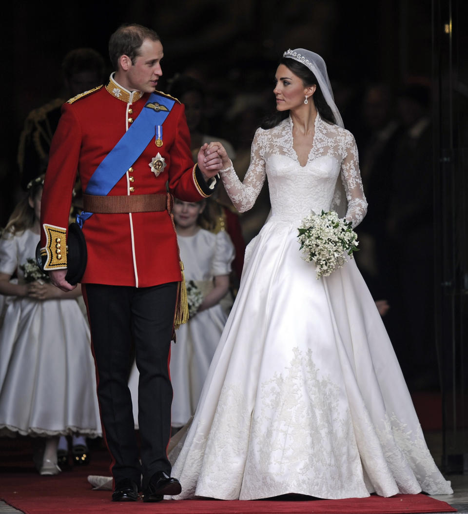 FILE - This April 29, 2011 file photo shows Britain's Prince William and his wife Kate, Duchess of Cambridge outside of Westminster Abbey after their Royal Wedding in London. (AP Photo/Martin Meissner, File)