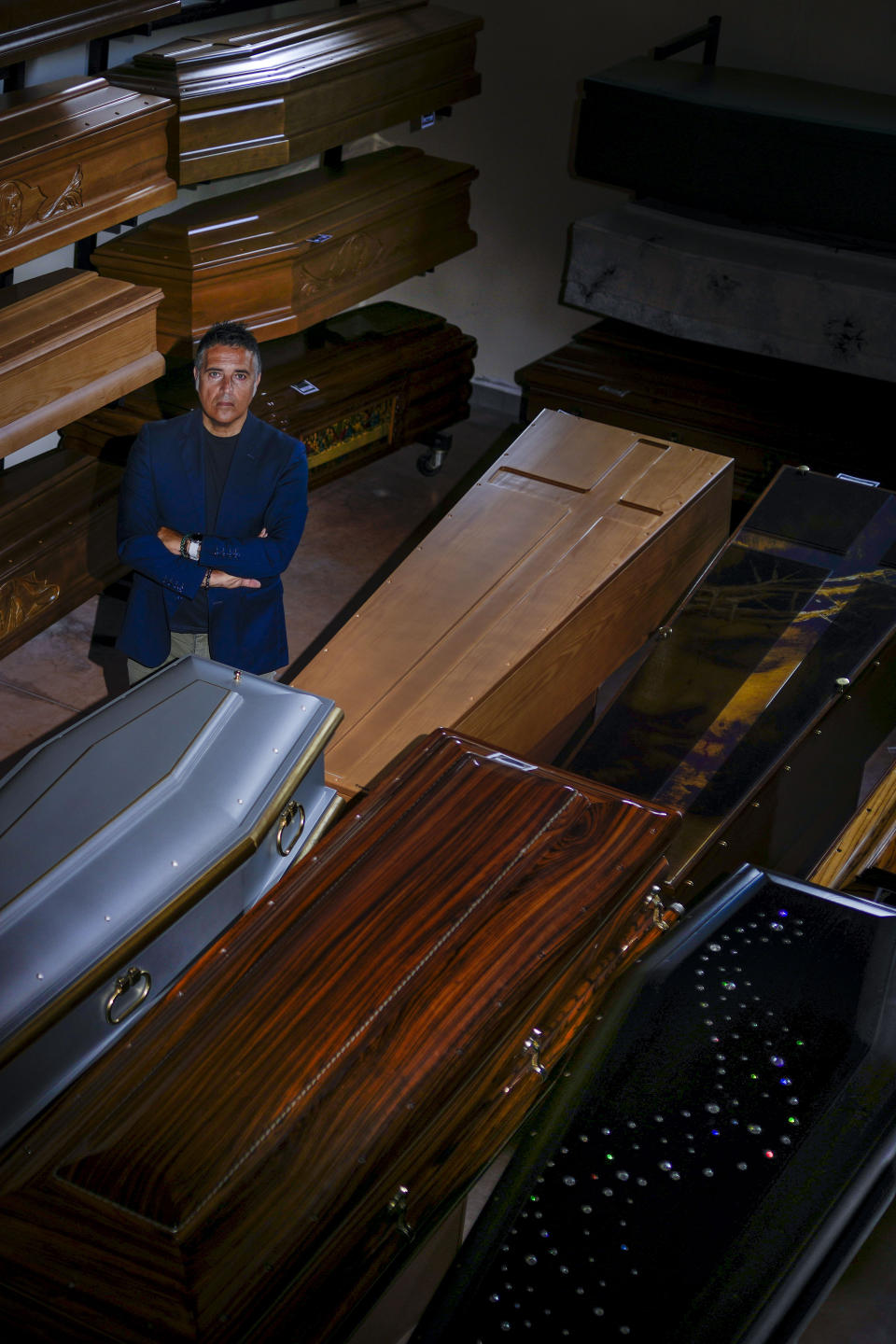 Antonio Ruggieri poses in his funeal home in Voltarrosto, near Teramo in central Italy, Monday, June 5, 2023. The majority of Italians still want a church funeral, even as most don’t attend Mass regularly. (AP Photo/Domenico Stinellis)