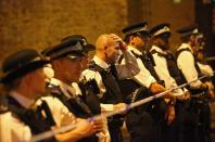 <p>Police officers attend to the scene after a vehicle collided with pedestrians near a mosque in the Finsbury Park neighborhood of North London, Britain June 19, 2017. (Neil Hall/Reuters) </p>