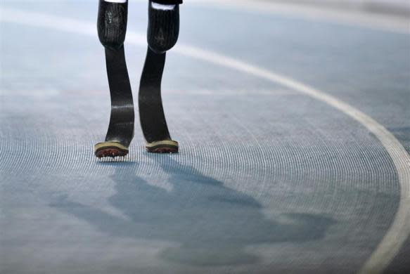 Oscar Pistorius of South Africa walks before the men's 400 meters semi-final at the IAAF World Championships in Daegu August 29, 2011.