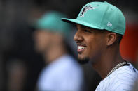 Miami Marlins starting pitcher Eury Perez waits to take the field in his major league debut, against the Cincinnati Reds in a baseball game Friday, May 12, 2023, in Miami. (AP Photo/Michael Laughlin)