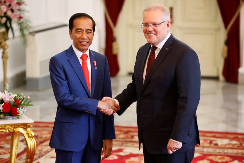 Indonesian president Joko Widodo shakes hands with Australian Prime Minister Scott Morrison at the Presidential Palace in Jakarta