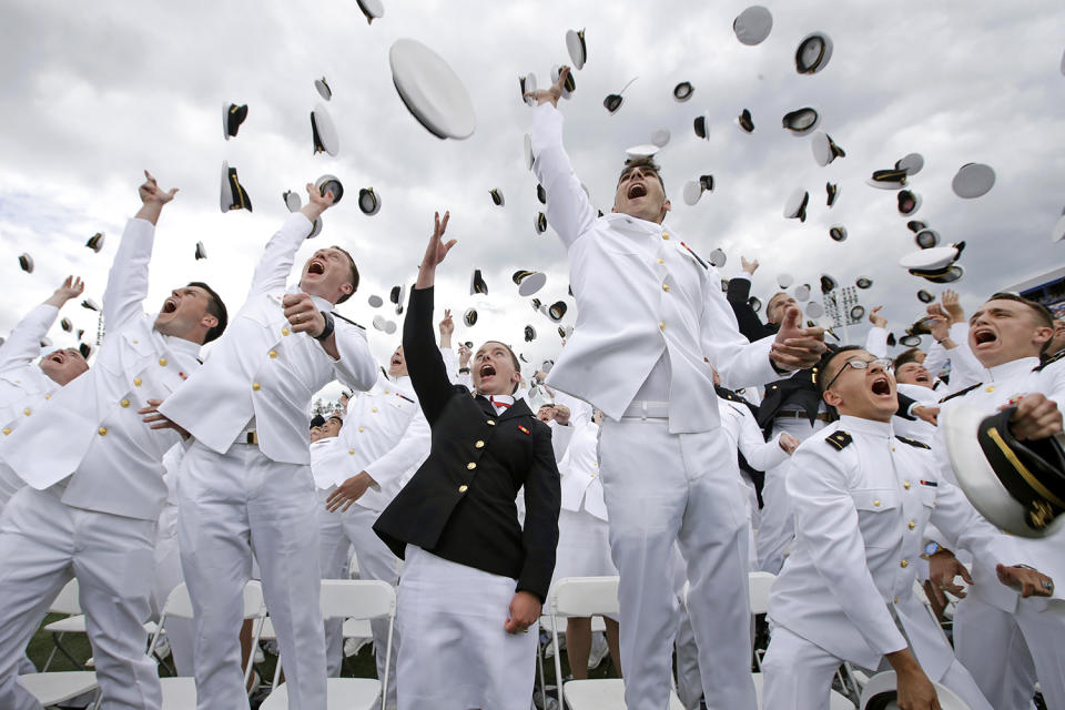 <p>U.S. Naval Academy graduates throw their hats into the air in celebration at the end of the academy’s graduation and commissioning ceremony in Annapolis, Md., Friday, May 26, 2017. (Photo: Patrick Semansky/AP) </p>