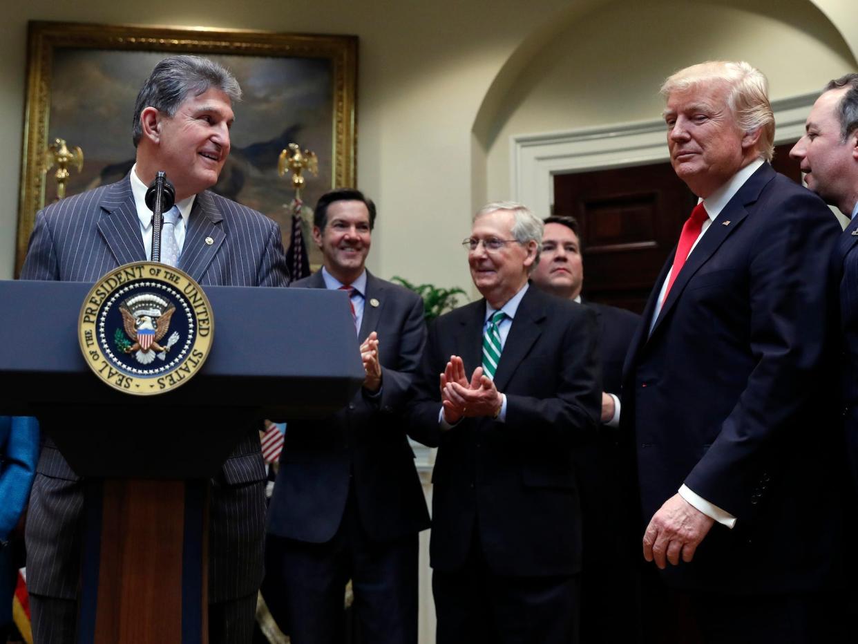 Democratic Sen. Joe Manchin of West Virginia speaks during a bill signing ceremony at the White House with former President Donald Trump on Thursday, Feb. 16, 2017.