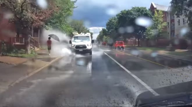 While it might be too tempting for some, splashing pedestrians on the footpath can land you a huge fine. Image: Yahoo News UK