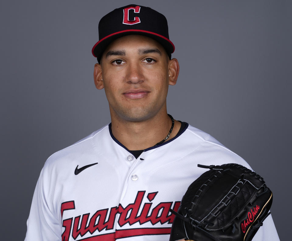 FILE - Cleveland Guardians' Daniel Espino poses for a photo Thursday, Feb. 22, 2024, in Goodyear, Ariz. Espino had his second shoulder surgery March 13, 2024, since being a first-round draft pick in 2019. (AP Photo/Carolyn Kaster, File)