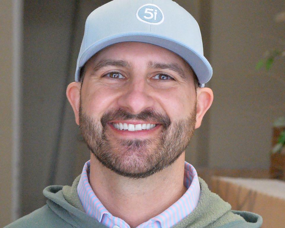 Five Iron Golf managing co-owner Chase Rogan, 39, is shown inside the Erie location, under construction, on Feb. 8, 2024.