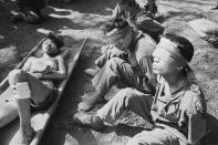 <p>Blindfolded Vietnamese prisoners of war, Vietnam, 1973. (Photo: Terry Fincher/Daily Express/Hulton Archive/Getty Images) </p>