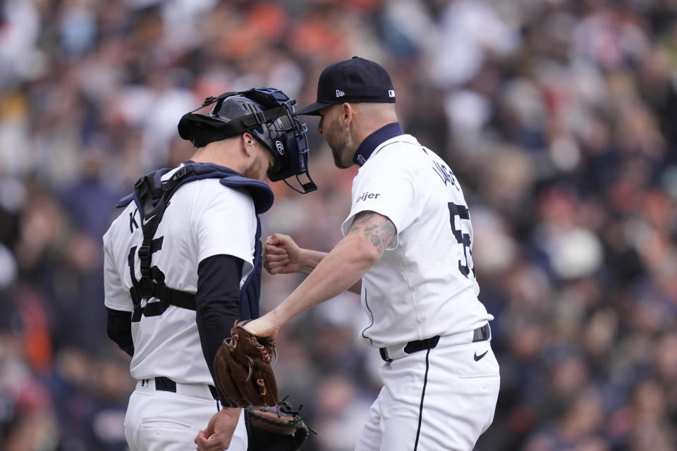 Detroit Tigers pitcher Alex Lange greets catcher Jake Rogers after the ninth inning of a baseball game against the Oakland Athletics, Friday, April 5, 2024, in Detroit. (AP Photo/Carlos Osorio)