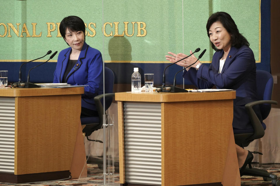 Sanae Takaichi, left, and Seiko Noda, right, both former internal affairs ministers and candidates for the presidential election of the ruling Liberal Democratic Party, attend a debate session held by Japan National Press club Saturday, Sept. 18, 2021 in Tokyo. The inclusion of two women among the four candidates vying to become the next prime minister seems like a big step forward for Japan's notoriously sexist politics. (AP Photo/Eugene Hoshiko, Pool)