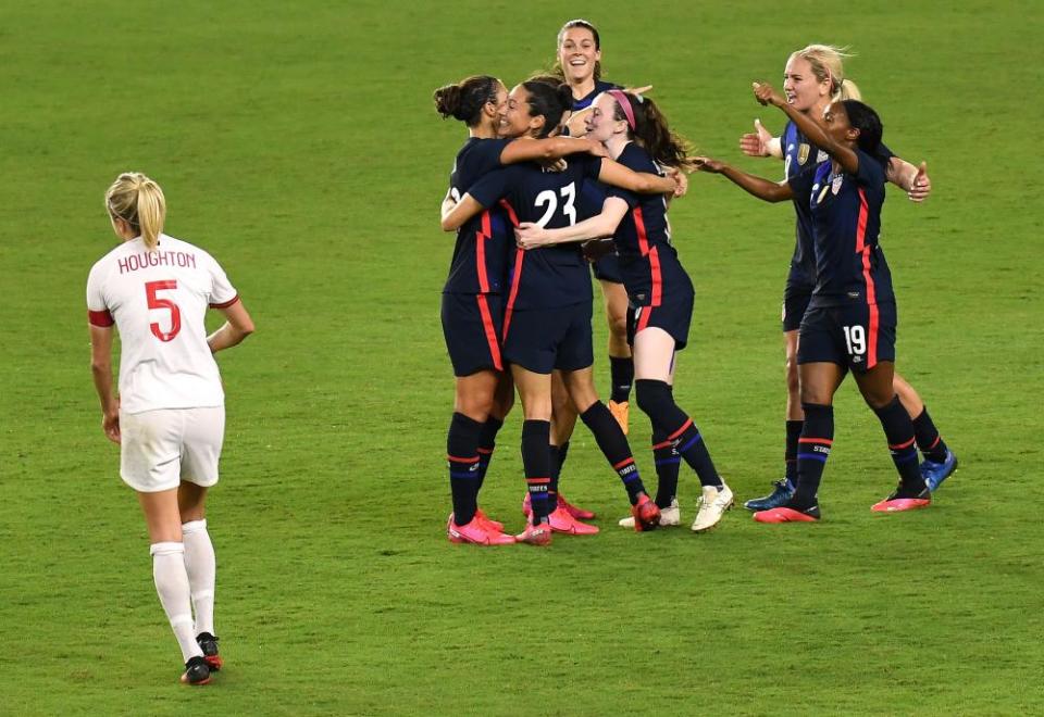 USA players celebrate a goal by Christen Press (23) in the second half of Thursday’s match.