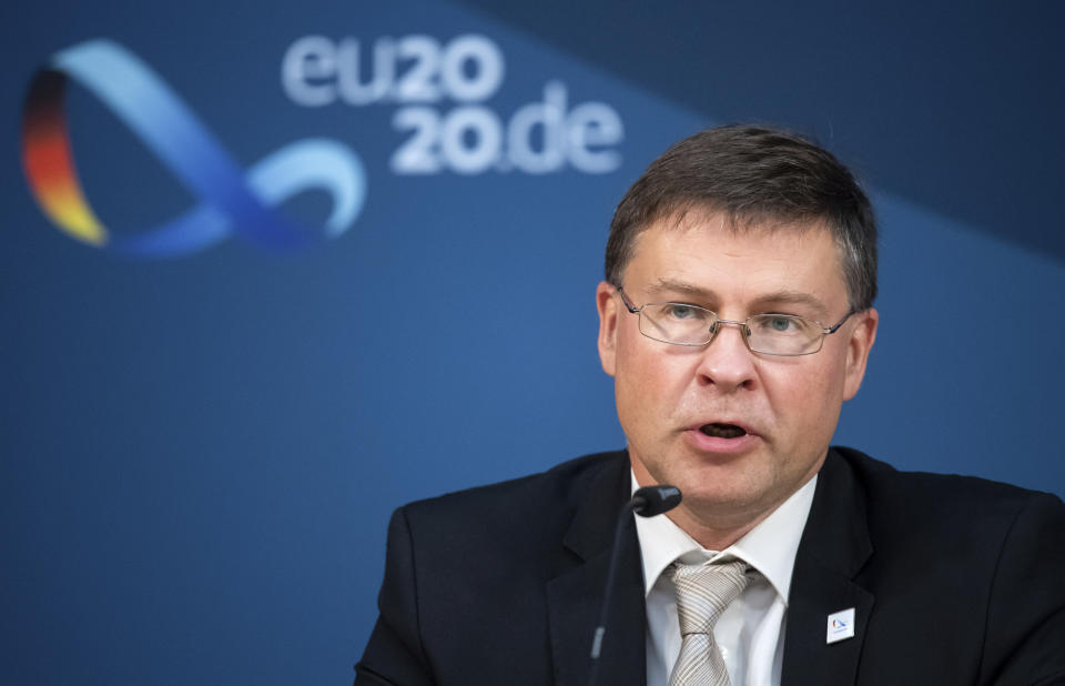 Valdis Dombrovskis, Vice-President of the EU Commission, speaks at a press conference in Berlin, Germany, following the informal talks of the EU Trade Ministers on Monday, Sept. 21, 2020. (Bernd von Jutrczenka/Pool via AP)