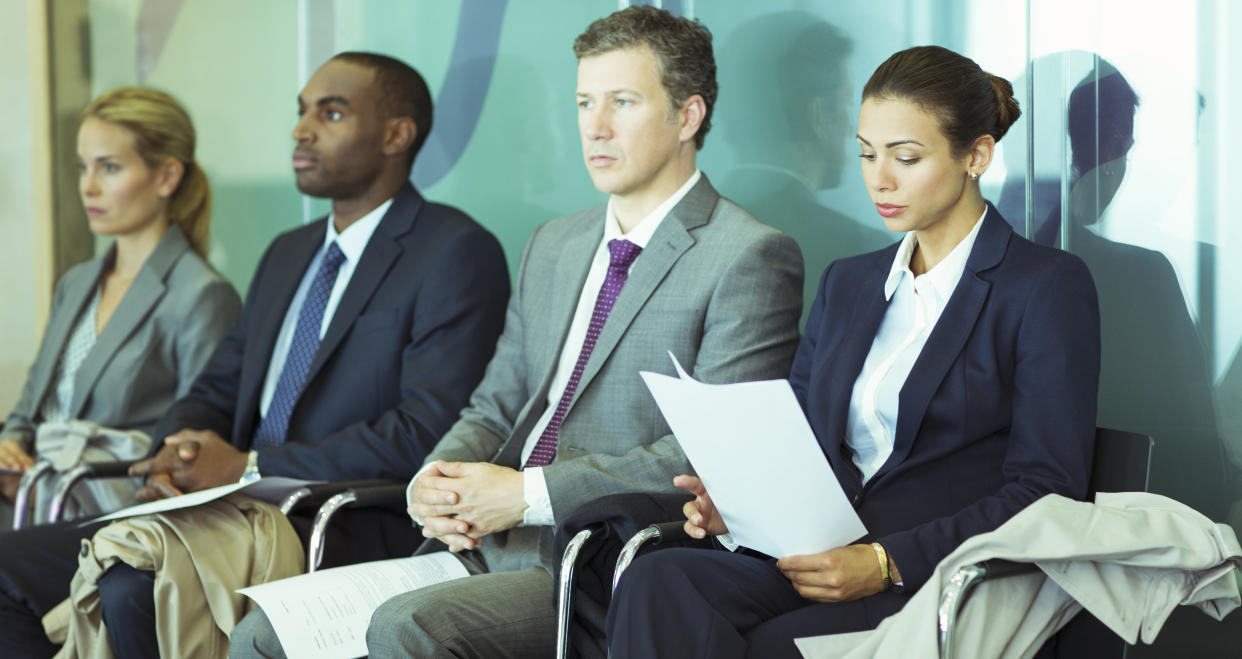 Business people sitting in a waiting area