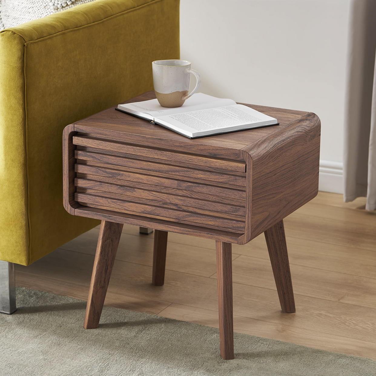 <p><a href="https://go.redirectingat.com?id=74968X1596630&url=https%3A%2F%2Fwww.walmart.com%2Fip%2FMopio-Ensley-Mid-Century-Modern-Nightstand-Side-Table-End-Table-with-Wood-Slat-Drawer-Storage-for-Living-Room-and-Bedroom-Walnut-Grain%2F278868893&sref=https%3A%2F%2Fwww.housebeautiful.com%2Fshopping%2Fbest-stores%2Fg43482617%2Fwalmart-furniture-sale%2F" rel="nofollow noopener" target="_blank" data-ylk="slk:Shop Now;elm:context_link;itc:0;sec:content-canvas" class="link rapid-noclick-resp">Shop Now</a></p><p>Midcentury Modern Nightstand</p><p>walmart.com</p><p>$113.05</p>