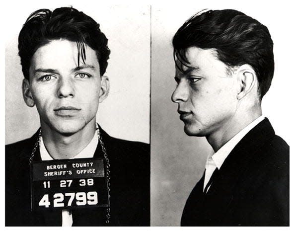BERGEN COUNTY, NJ - 1938: Pop singer Frank Sinatra poses for a mug shot after being arrested and charged with "carrying on with a married woman" in 1938 in Bergen County, New Jersey. (Photo by Michael Ochs Archives/Getty Images)