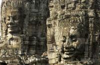 The carved heads at the Bayon temple are believed to bear a resemblance to the Khmer king.