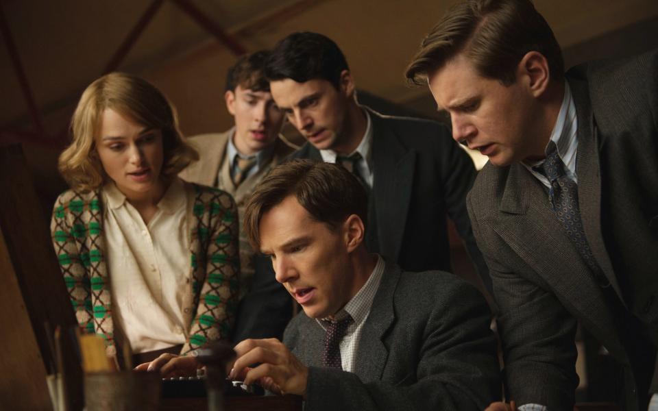 Benedict Cumberbatch (below, centre) as Alan Turing in the film The Imitation Game - AP