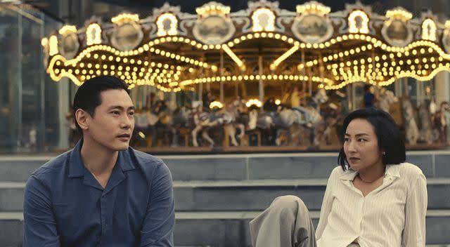 <p>Courtesy of Twenty Years Rights/A24 Films</p> Teo Yoo and Greta Lee in Past Lives