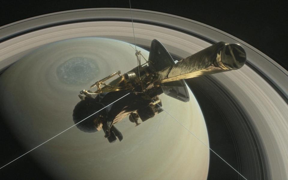 The Cassini spacecraft circling Saturn on 29 August 2017 - REUTERS